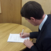 Mark signs his British Sign Language (BSL) (Scotland) Bill<br/><a href="gallery/your-voice-in-holyrood/87/add/#comments">Add comment</a>