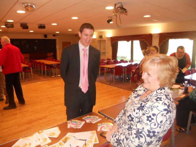 Mark shares a joke with Action on Hearing Loss organiser