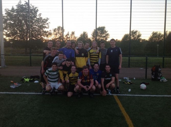 Mark dons his footie boots for charity