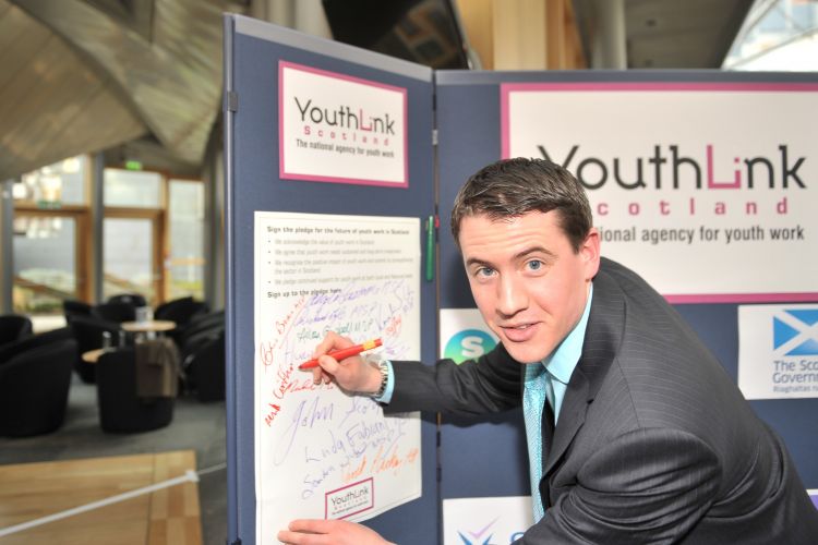 Mark signs the Youth Link pledge
